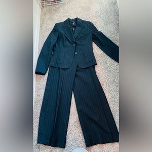 Black with thin white vertical striped pant suit